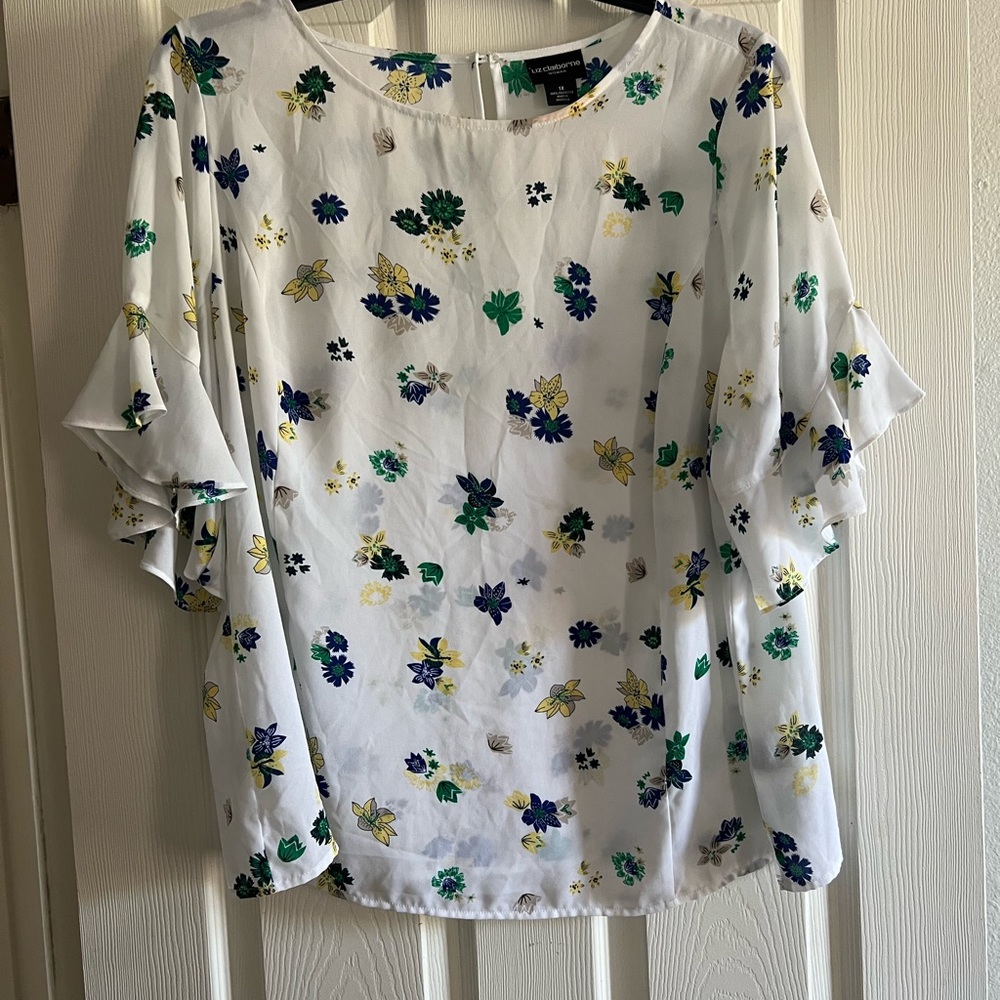 White floral blouse.